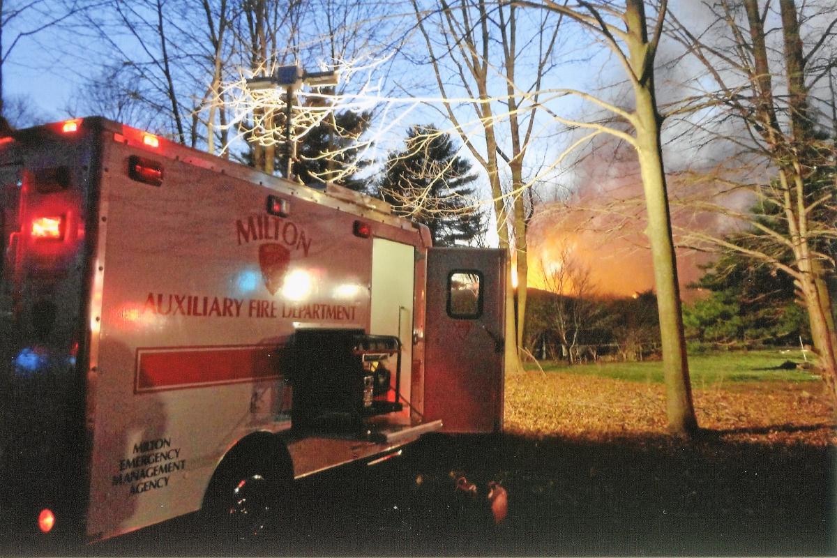 Firetruck with Fire in the Background