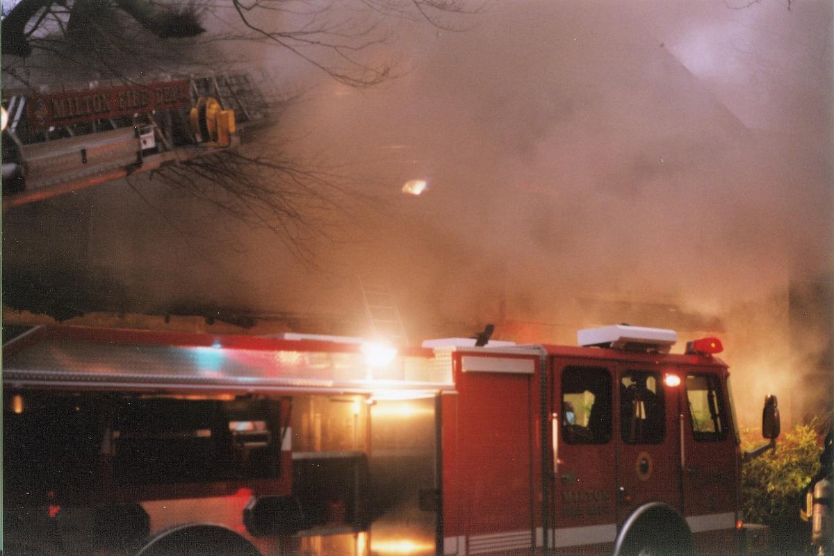 Fire Apparatus in Front of a Burning Building